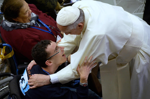 Pope Francis meets a disabled man &#8211; pt