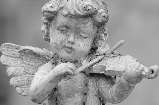little angel playing violin &#8211; detail of cemetery decor, Italy &#8211; pt