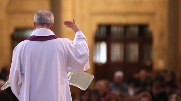 Catholic mass. Priest.