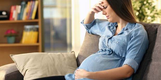 web3-upset-woman-pregnant-crying-home-shutterstock