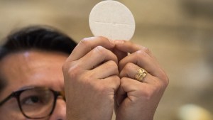 PRIEST,EUCHARIST,HOST,CONSECRATION