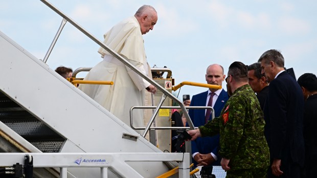 Pope-Francis-disembarks-his-airplane-at-the-Quebec-airport-AFP